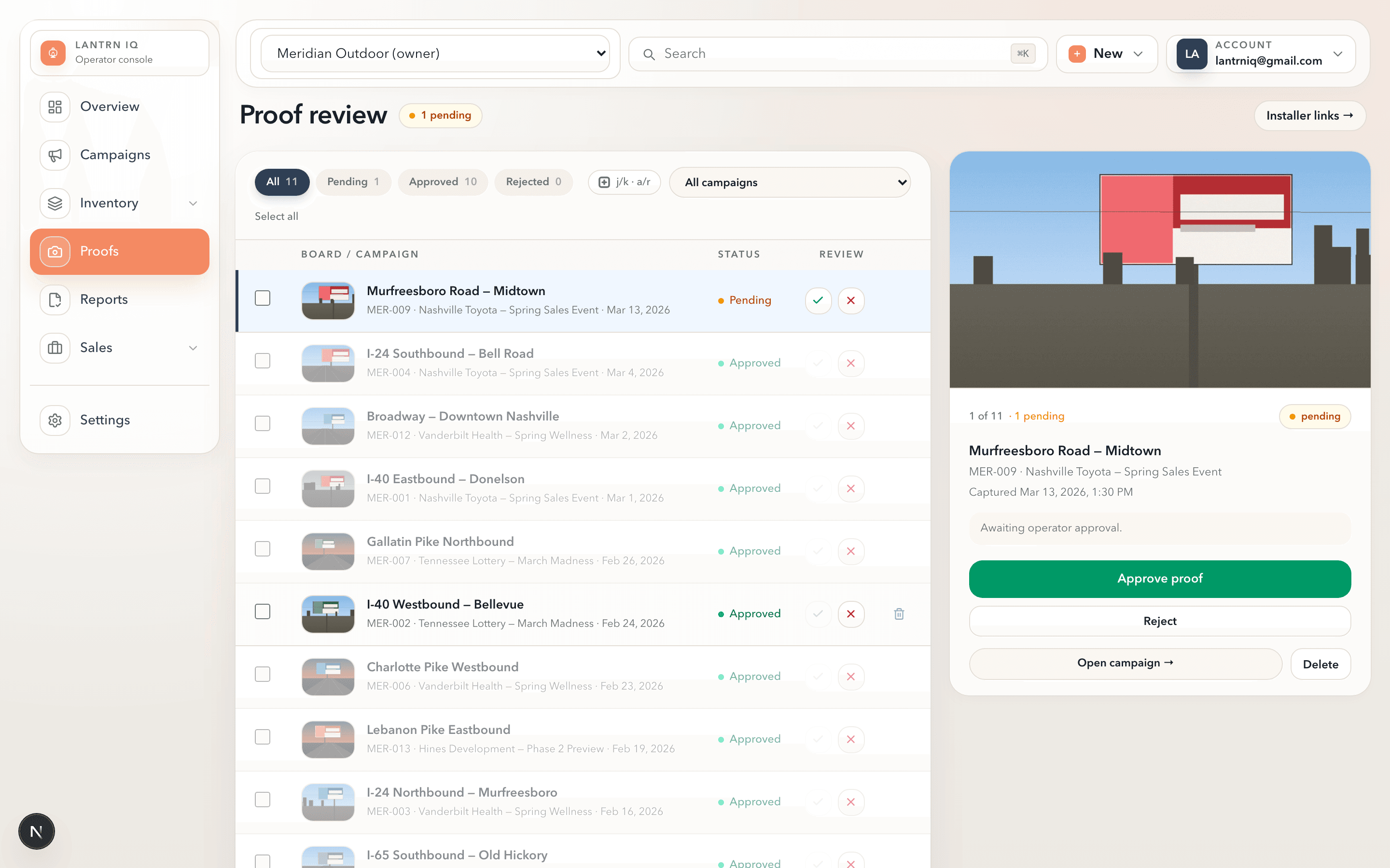 Lantrn IQ proof review queue — billboard photo on the right, approve/reject workflow on the left